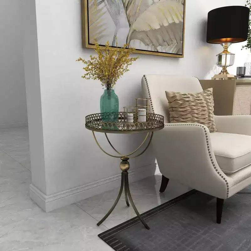 Table ronde à pied en métal et verre doré
