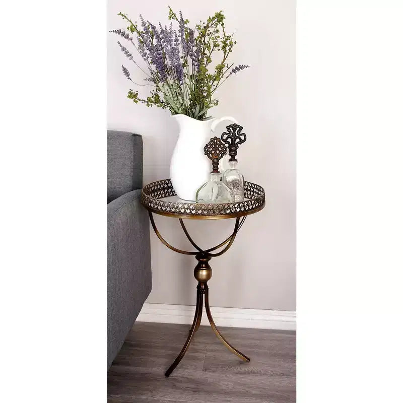 Table ronde à pied en métal et verre doré
