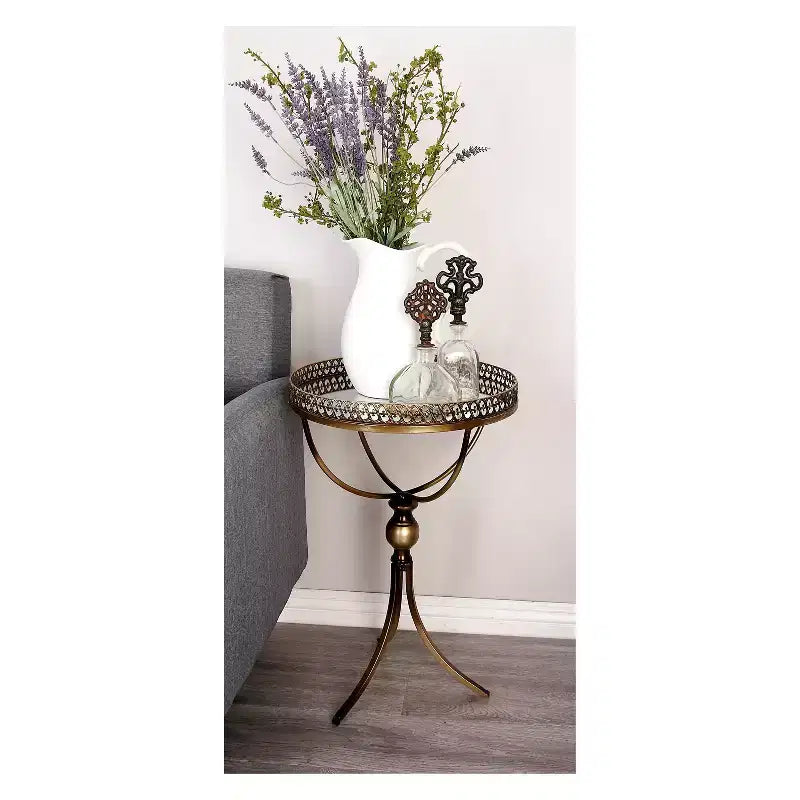 Table ronde à pied en métal et verre doré